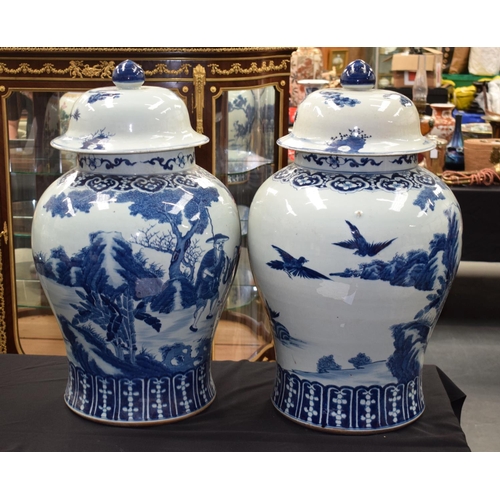 1449 - A LARGE PAIR OF CHINESE BLUE AND WHITE GINGER JARS AND COVERS 20th Century, painted with figures and... 