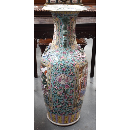 1450 - A VERY LARGE CHINESE CANTON FAMILLE ROSE FLOOR VASE Late Qing/Republic, painted with figures and chi... 