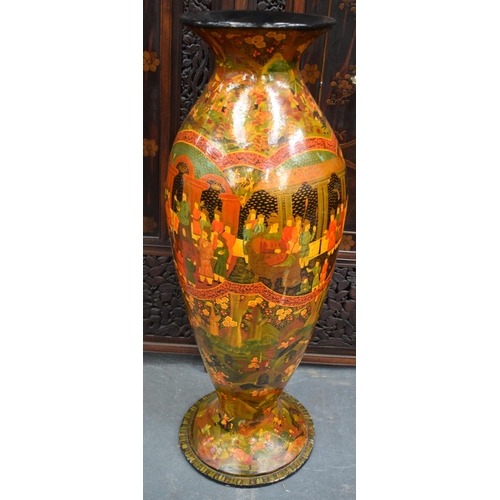 1451 - A VERY LARGE PERSIAN QAJAR BLACK LACQUERED VASE painted with figures in various pursuits. 100 cm x 3... 