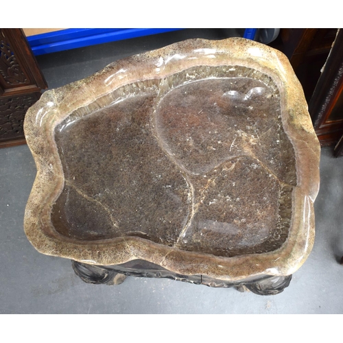 1452 - A LARGE EARLY 20TH CENTURY CHINESE FLUORITE TABLE upon a lacquered hardwood base. 70 cm x 60 cm.