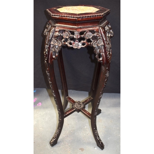 1461 - AN EARLY 20TH CENTURY CHINESE MARBLE INSET HARDWOOD STAND Late Qing. 97 cm x 36 cm.