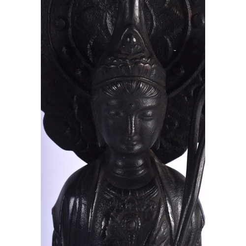 1470 - A VERY LARGE CHINESE IRON FIGURE OF A STANDING BUDDHISTIC DEITY modelled upon a lotus throne. 58 cm ... 