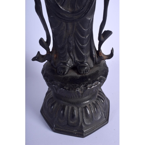 1470 - A VERY LARGE CHINESE IRON FIGURE OF A STANDING BUDDHISTIC DEITY modelled upon a lotus throne. 58 cm ... 