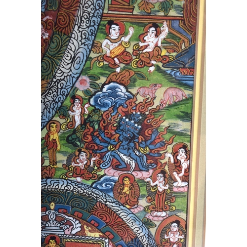 1472 - AN EARLY 20TH CENTURY INDIAN TIBETAN SOUTH EAST ASIAN PAINTED THANGKA depicting Buddhistic deity. Im... 