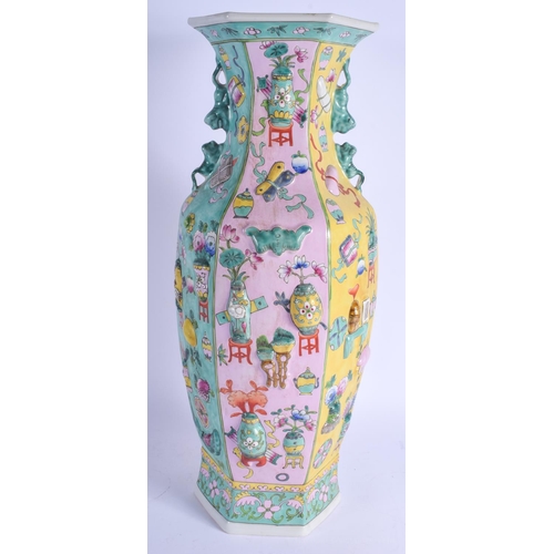 1485 - A LARGE CHINESE FAMILLE ROSE STRAITS VASE 20th Century, painted in relief with precious objects and ... 