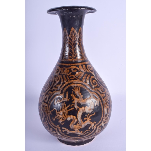 1494 - A CHINESE BROWN GLAZED POTTERY VASE 20th Century, decorated with a dragon amongst foliage. 29 cm hig... 