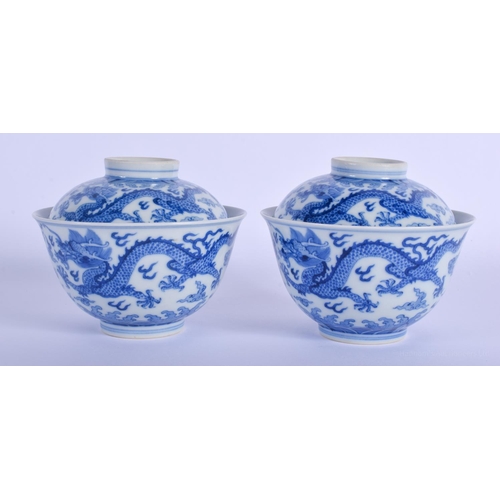 1503 - A PAIR OF CHINESE BLUE AND WHITE PORCELAIN DRAGON BOWLS AND COVERS 20th Century, bearing Qianlong ma... 