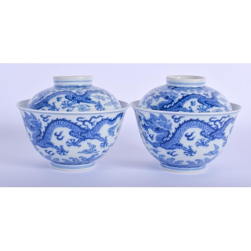 1503 - A PAIR OF CHINESE BLUE AND WHITE PORCELAIN DRAGON BOWLS AND COVERS 20th Century, bearing Qianlong ma... 