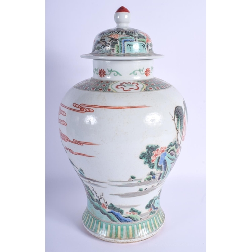 1509 - A 19TH CENTURY CHINESE FAMILLE VERTE VASE AND COVER Kangxi style, painted with landscapes. 43 cm x 1... 