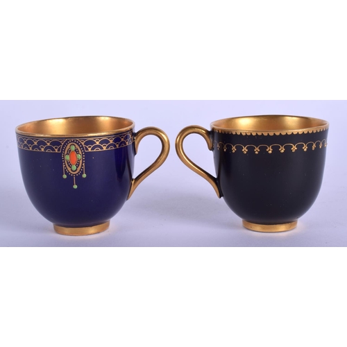 151 - Royal Worcester demi tasse coffee cup and saucer painted in black art deco style and another similar... 