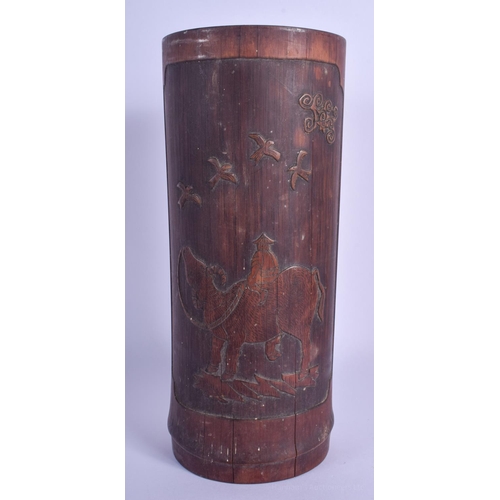 1525 - A 19TH CENTURY CHINESE CARVED BAMBOO BITONG BRUSH POT decorated with figures on a buffalo. 26 cm hig... 