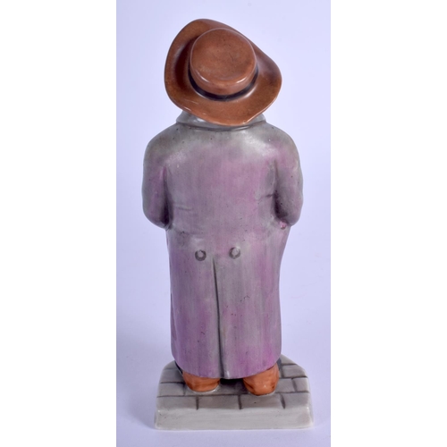 153 - Royal Worcester figure of a man with a long coat, his hands in his pockets c. 1880. 14 cm high