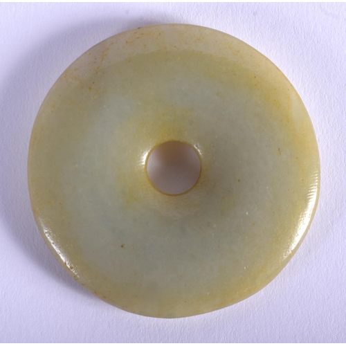 1537 - A CHINESE JADE BI DISC 20th Century. 6 cm wide.