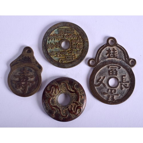 1550 - FOUR CHINESE BRONZE TOKENS. (4)