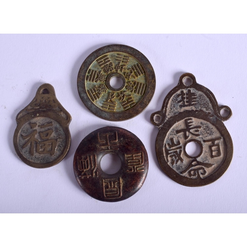 1550 - FOUR CHINESE BRONZE TOKENS. (4)