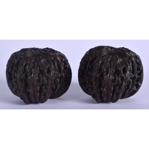 1552 - A PAIR OF CHINESE BRONZE WALNUTS 20th Century. 3 cm x 3 cm.