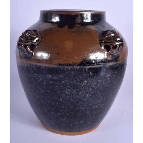 1596 - A CHINESE BROWN GLAZED STONE WARE JAR with mask head mounts. 24 cm x 16 cm.