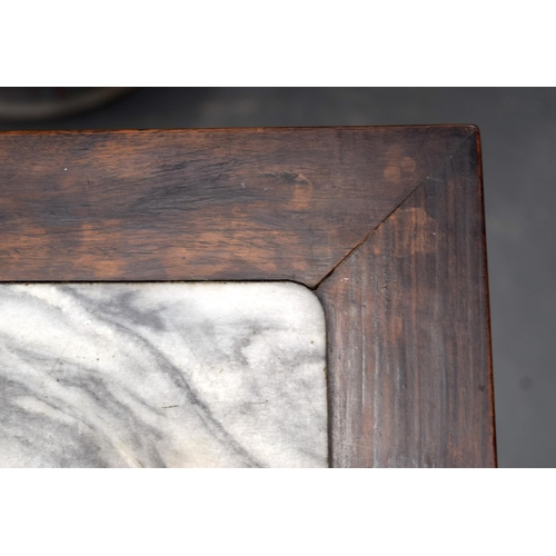 1638 - A 19TH CENTURY CHINESE HARDWOOD MARBLE INSET TABLE. 77 cm x 41 cm.