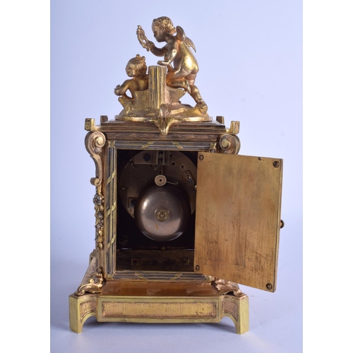 1755 - A MID 19TH CENTURY FRENCH ORMOLU LIMOGES ENAMEL MANTEL CLOCK painted with putti and foliage. 30 cm h... 