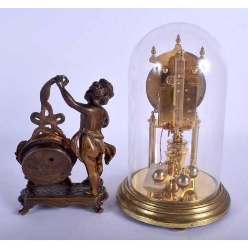 1758 - AN ANTIQUE SPELTER DESK CLOCK together with an anniversary clock. Largest 22 cm high. (2)