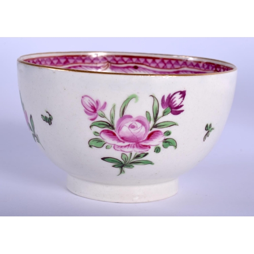 176 - 18th c. Caughley tea bowl and saucer painted roses scattered flowers and a pink scale boarder