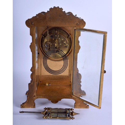 1762 - A GOOD 19TH CENTURY FRENCH BRONZE AND CHAMPLEVÉ ENAMEL MANTEL CLOCK painted with a female within a l... 