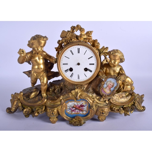 1770 - A 19TH FRENCH ORMOLU AND SEVRES PORCELAIN MANTEL CLOCK formed with cherubs amongst foliage. 34 cm x ... 