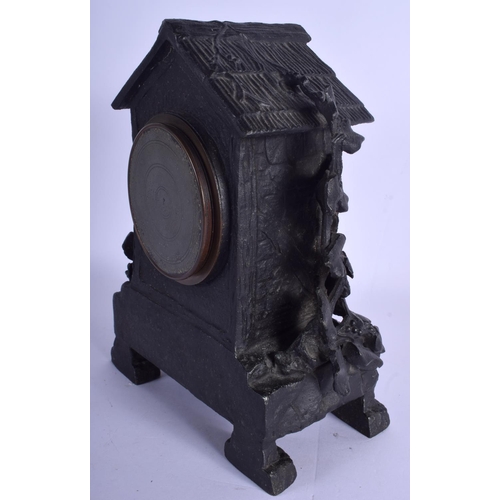 1771 - AN UNUSUAL 19TH CENTURY EUROPEAN PAINTED SPELTER CLOCK modelled as a black forest cuckoo clock. 30 c... 