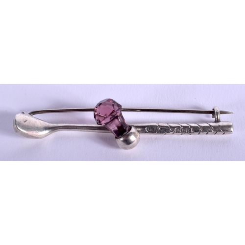 1802 - A RARE ANTIQUE SILVER AND AMETHYST GOLF CLUB BROOCH. 5.5 cm wide.