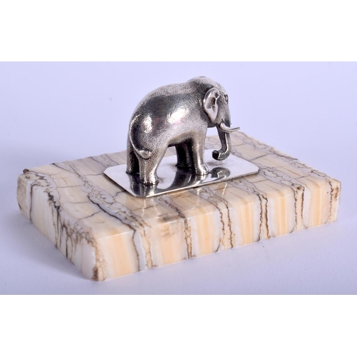 1808 - A CHARMING ANTIQUE SILVER AND MAMMOTH TOOTH ELEPHANT PAPERWEIGHT. 7 cm x 4.5 cm.