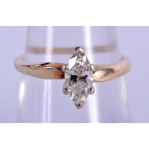 1821 - A 14CT GOLD MARQUISE CUT DIAMOND RING. M. 2.4 grams. Diamond 0.9 cm x 0.4 cm.