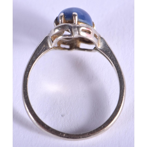 1834 - A WHITE GOLD BLUE GEM SET RING. 2.8 grams. N.