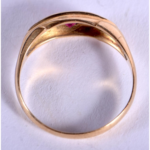 1889 - AN ANTIQUE 18CT GOLD AND RUBY RING. 2.2 grams. Q.