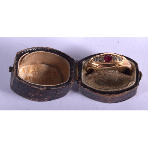 1889 - AN ANTIQUE 18CT GOLD AND RUBY RING. 2.2 grams. Q.