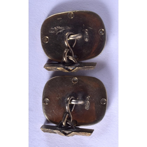 1904 - A PAIR OF CONTINENTAL SILVER AND ENAMEL PEARL CUFFLINKS. 16 grams.