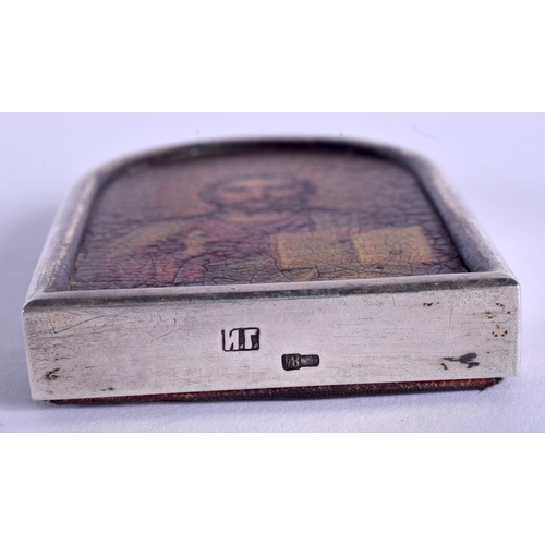 1908 - A 19TH CENTURY RUSSIAN SILVER AND LACQUERED ICON depicting a saint. 32.7 grams. 4 cm x 6.25 cm.