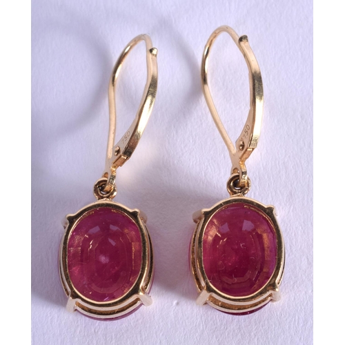 1948 - A PAIR OF GOLD AND RUBY EARRINGS. 5.5 grams.