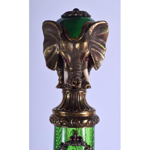 1952 - A BOXED CONTINENTAL SILVER GILT AND ENAMEL NEPHRITE JADE ELEPHANT PAPER KNIFE. 156 grams. 23 cm long... 