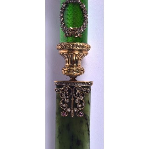 1952 - A BOXED CONTINENTAL SILVER GILT AND ENAMEL NEPHRITE JADE ELEPHANT PAPER KNIFE. 156 grams. 23 cm long... 