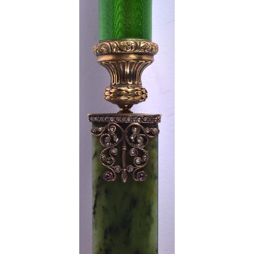 1952 - A BOXED CONTINENTAL SILVER GILT AND ENAMEL NEPHRITE JADE ELEPHANT PAPER KNIFE. 156 grams. 23 cm long... 