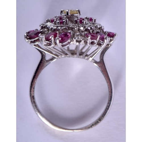 1960 - A 14CT GOLD RUBY AND DIAMOND CLUSTER RING. 6.9 grams. P.