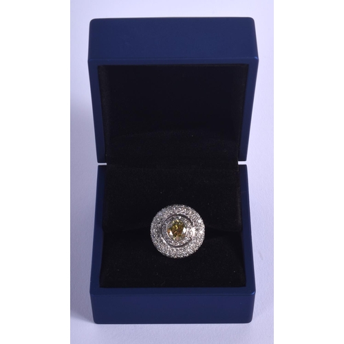 1967 - A GOOD 18CT GOLD AND FANCY YELLOW DIAMOND CLUSTER RING the central stone approx 1.5 cts. O. 17.3 gra... 