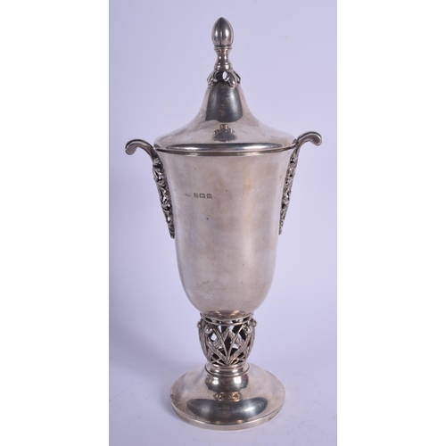 1981 - A TWIN HANDLED ARTS AND CRAFTS STYLE SILVER TROPHY. Birmingham 1928. 320 grams. 24 cm high.