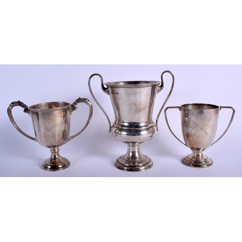 1982 - THREE VINTAGE SILVER DOG TROPHIES including the Awl Dogg trophy. 623 grams. (3)