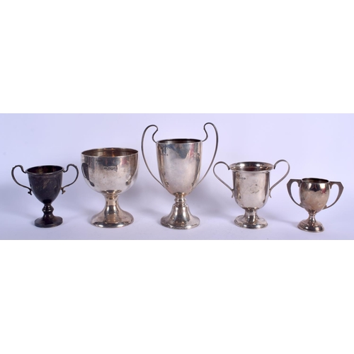 1983 - FIVE VINTAGE SILVER DOG TROPHIES including the Mooda Sparkle cup. 574 grams. (5)