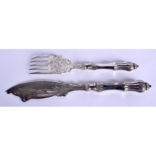 1988 - A PAIR OF VICTORIAN SILVER FISH SERVERS. Sheffield 1881. 279 grams. 27 cm long.