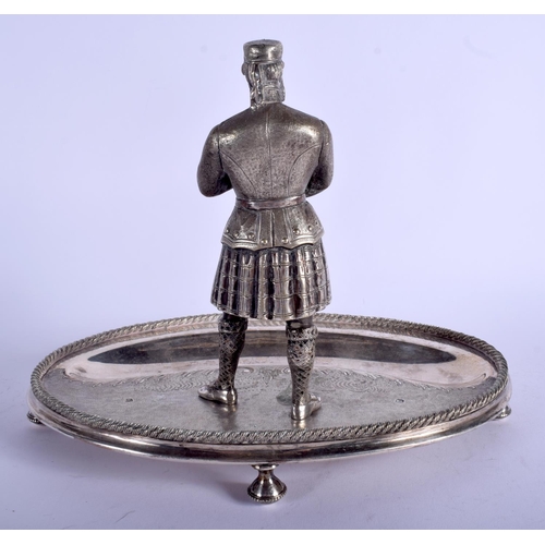 1997 - A RARE ANTIQUE SILVER PLATED GOLFING DESK STAND formed with a standing male beside the bunker. 24 cm... 