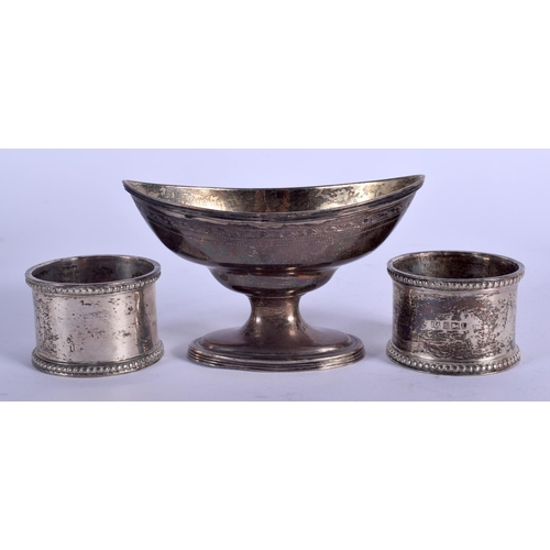 2010 - A GEORGE III SILVER SALT London 1796 & two silver napkin rings Sheffield 1903 & 1906. 170 grams. (3)