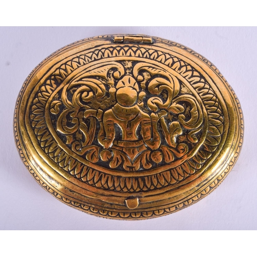 2024 - AN 18TH/19TH CENTURY INDIAN BRASS BUDDHISTIC SNUFF BOX. 7 cm x 5.25 cm.