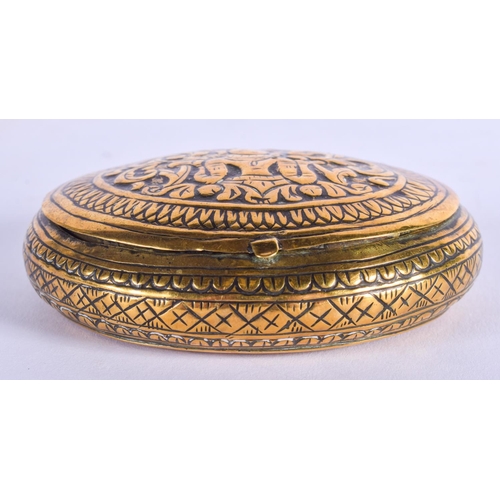 2024 - AN 18TH/19TH CENTURY INDIAN BRASS BUDDHISTIC SNUFF BOX. 7 cm x 5.25 cm.